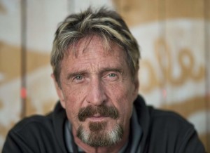 Antivirus pioneer John McAfee poses for a photograph in Montreal, Friday, August 24, 2013.(AP Photo/The Canadian Press, Graham Hughes)