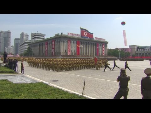 N. Korea denies hack; issues new threat