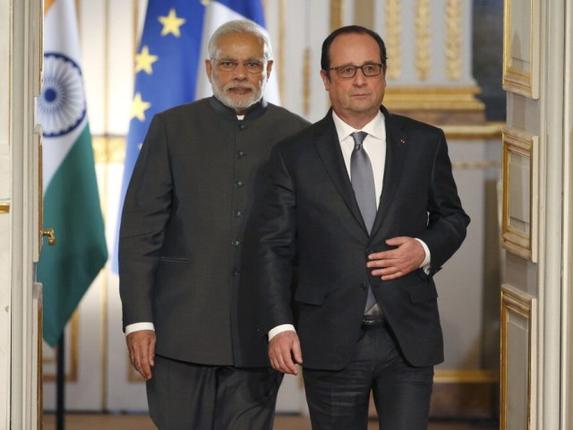 PM Modi meets British PM, French President